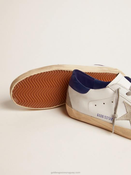hombres zapatillas super-star con estrella de ante y refuerzo azul en el talónGolden Goose 02H6502