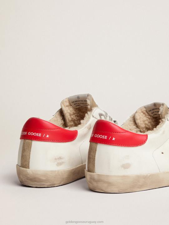 hombres zapatillas super-star con refuerzo de cuero rojo en el talón y forro de borregoGolden Goose 02H6591