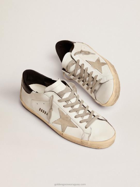 hombres zapatillas super-star con refuerzo negro en el talón y letras con tachuelas de metalGolden Goose 02H6581