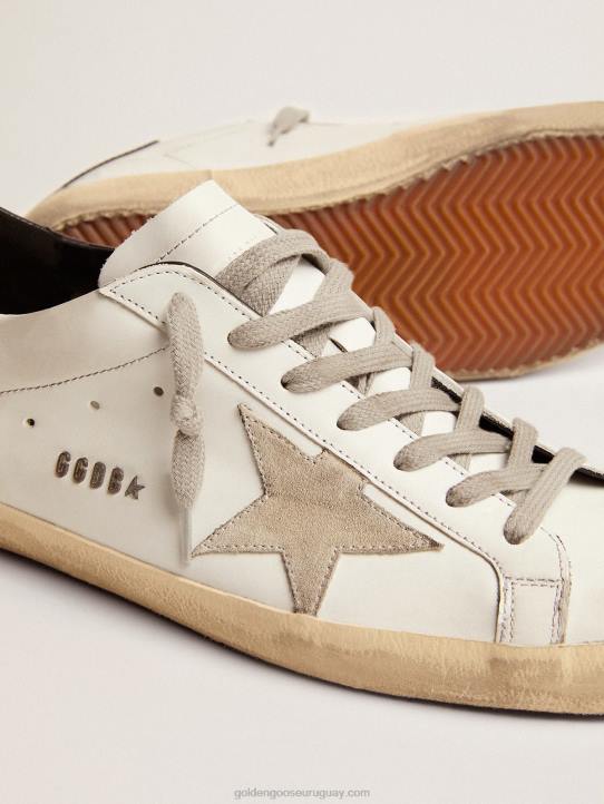 hombres zapatillas super-star con refuerzo negro en el talón y letras con tachuelas de metalGolden Goose 02H6581