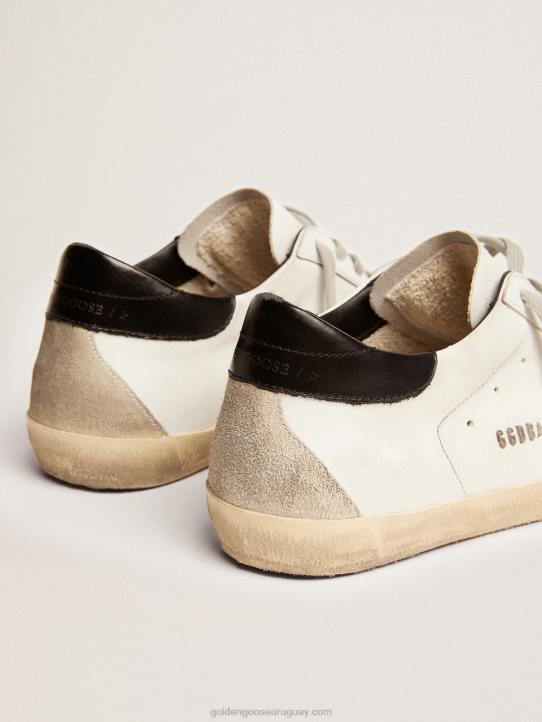 hombres zapatillas super-star con refuerzo negro en el talón y letras con tachuelas de metalGolden Goose 02H6581