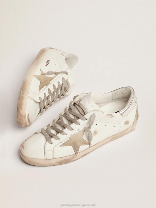 hombres zapatillas super-star con tira plateada en el talón y letras con tachuelas metálicasGolden Goose 02H6575