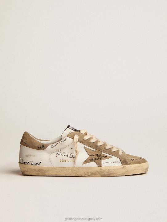 hombres zapatillas super-star de piel blanca con inserciones de ante gris tórtola y letras negras por toda la superficieGolden Goose 02H6511