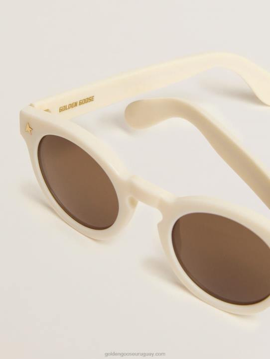 mujer marco solar estilo cameron panthos con marco blanco y detalles doradosGolden Goose 02H6350