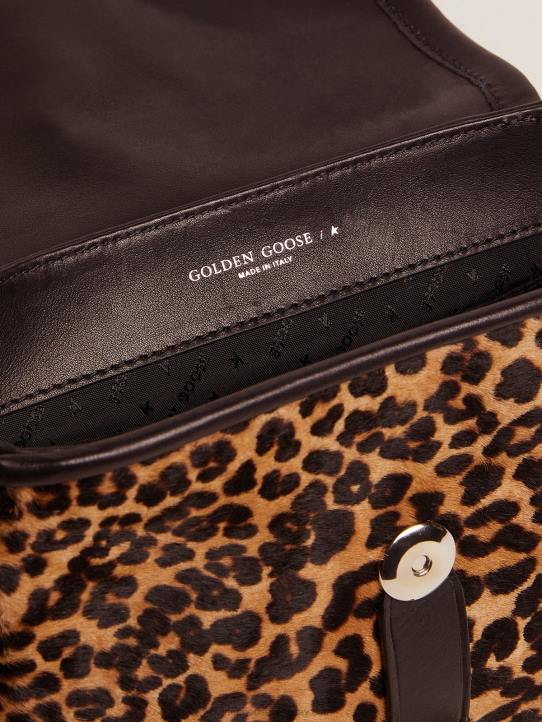 mujer bolso rodeo pequeño de piel negra y piel de potro con estampado de leopardoGolden Goose 02H6475