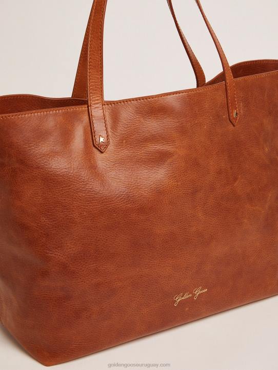 mujer bolso pasadena color canela con logo dorado en el frenteGolden Goose 02H6467