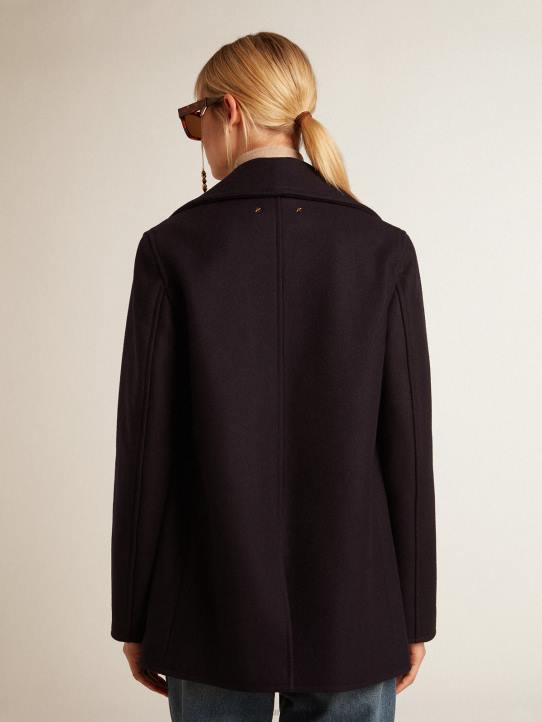 mujer chaquetón azul oscuro con botones heráldicos doradosGolden Goose 02H6919