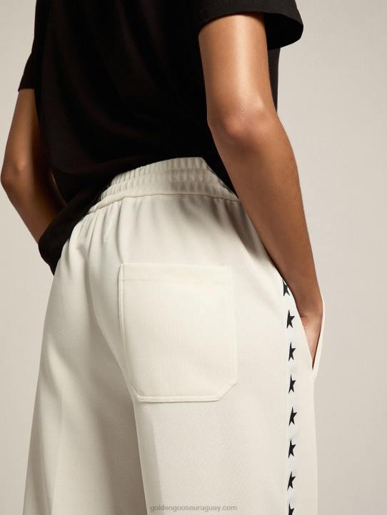 mujer joggers blancos con estrellas a los ladosGolden Goose 02H61060
