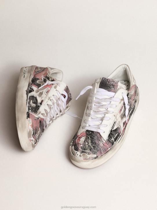 mujer stardan lab en cuero con salpicaduras de pintura por toda la superficieGolden Goose 02H6214