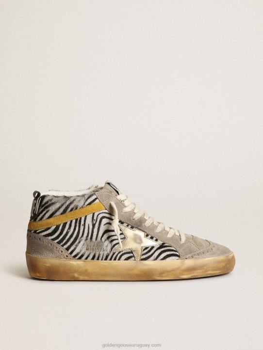mujer Deportivas mid star de piel de potro con estampado de cebra, estrella de piel metalizada dorada y destello de ante color mostazaGolden Goose 02H622