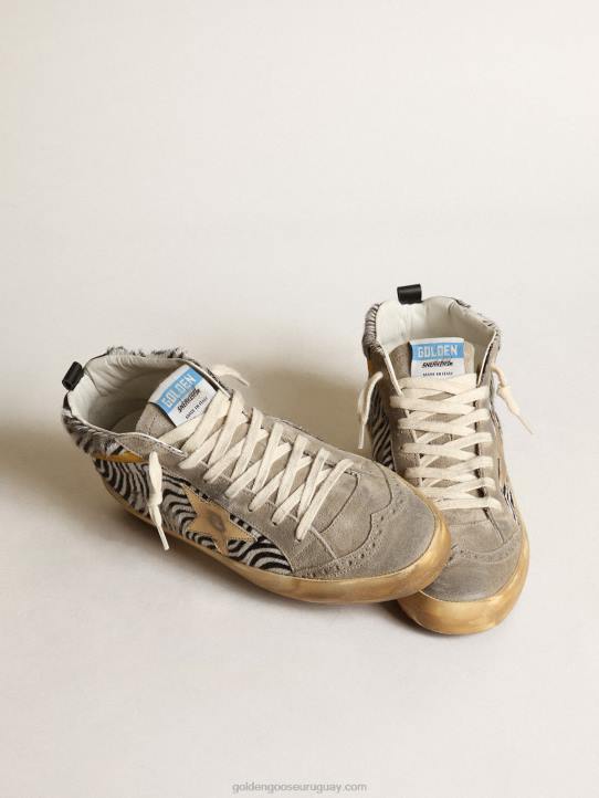 mujer Deportivas mid star de piel de potro con estampado de cebra, estrella de piel metalizada dorada y destello de ante color mostazaGolden Goose 02H622