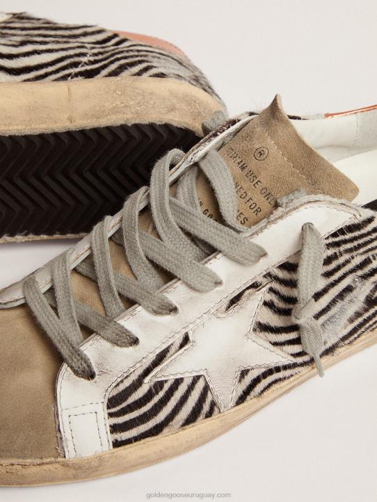 mujer Zapatillas deportivas super-star ltd de piel de potro con estampado de cebra y estrella de piel blancaGolden Goose 02H6123