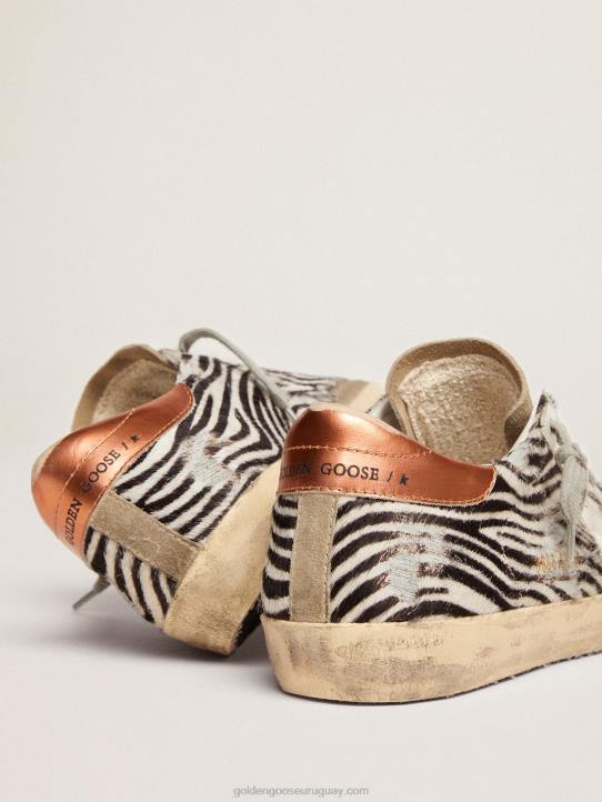 mujer Zapatillas deportivas super-star ltd de piel de potro con estampado de cebra y estrella de piel blancaGolden Goose 02H6123