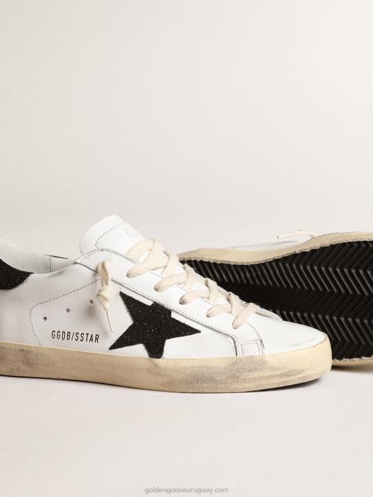 mujer superestrella con una estrella negra de cristal swarovski y refuerzo en el talónGolden Goose 02H6249