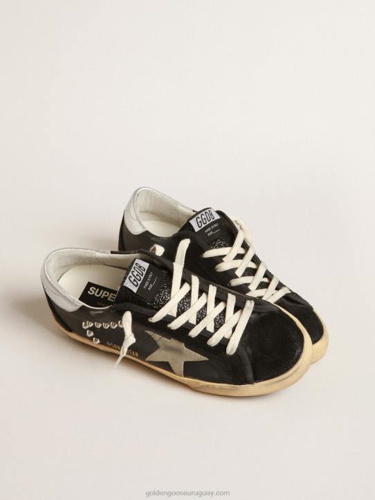 mujer superestrella de piel y ante negro con tachuelas plateadasGolden Goose 02H6219