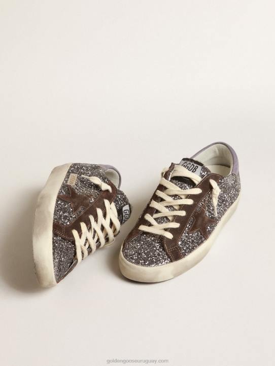 mujer superestrella en purpurina con estrella marrón y tirador lila en el talónGolden Goose 02H6240