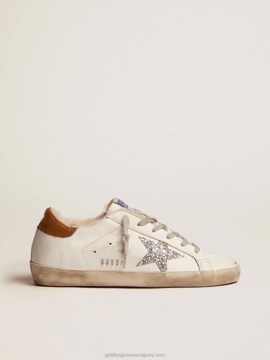 mujer zapatillas deportivas super-star con forro de borrego estrella plateada con purpurina y refuerzo del talón de piel gris tórtola con estampado de lagartosGolden Goose 02H686