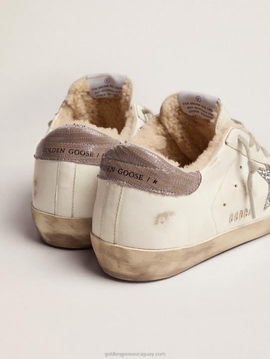 mujer zapatillas deportivas super-star con forro de borrego estrella plateada con purpurina y refuerzo del talón de piel gris tórtola con estampado de lagartosGolden Goose 02H686