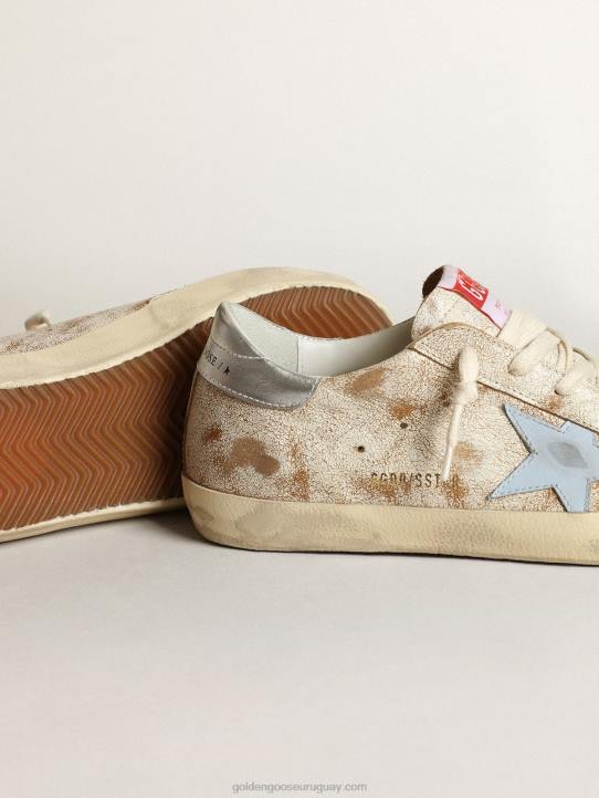 mujer zapatillas super-star con estrella de piel azul claro ahumado y refuerzo del talón de piel plateada metalizadaGolden Goose 02H650