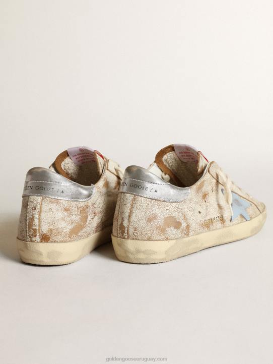 mujer zapatillas super-star con estrella de piel azul claro ahumado y refuerzo del talón de piel plateada metalizadaGolden Goose 02H650