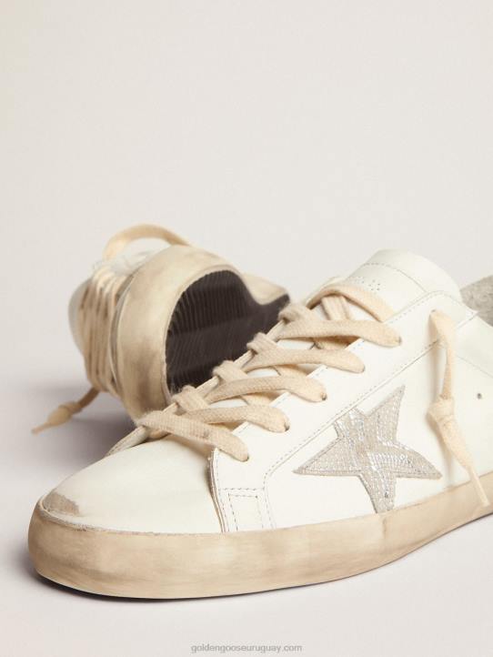 mujer zapatillas super-star con estrella de piel plateada con estampado de serpiente y refuerzo del talón con purpurina doradaGolden Goose 02H66