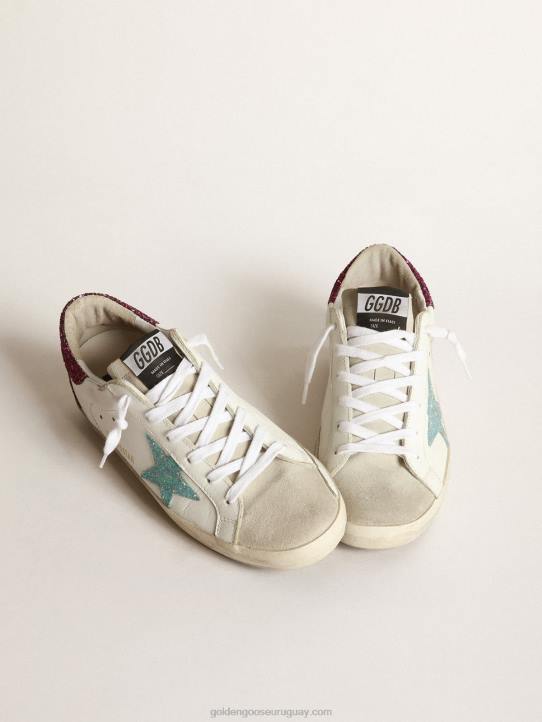 mujer zapatillas super-star con estrella de purpurina azul claro y refuerzo del talón con purpurina moradaGolden Goose 02H6267