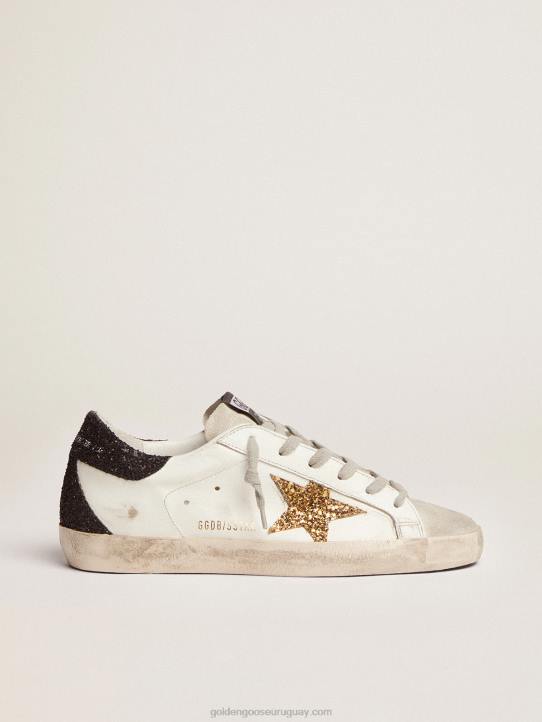 mujer zapatillas super-star con estrella dorada y refuerzo negro brillante en el talónGolden Goose 02H6277