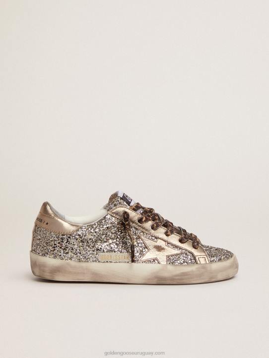 mujer zapatillas super-star de purpurina color platino con estrella y refuerzo en el talón de piel laminada tono sobre tonoGolden Goose 02H6286