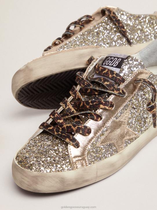 mujer zapatillas super-star de purpurina color platino con estrella y refuerzo en el talón de piel laminada tono sobre tonoGolden Goose 02H6286