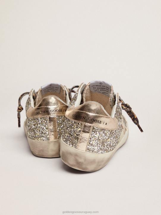 mujer zapatillas super-star de purpurina color platino con estrella y refuerzo en el talón de piel laminada tono sobre tonoGolden Goose 02H6286