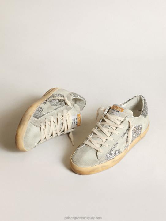 mujer zapatillas super-star en purpurina plateada con estrella e inserciones de ante gris hieloGolden Goose 02H612