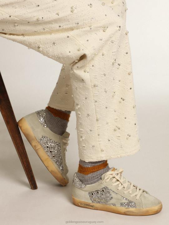 mujer zapatillas super-star en purpurina plateada con estrella e inserciones de ante gris hieloGolden Goose 02H612