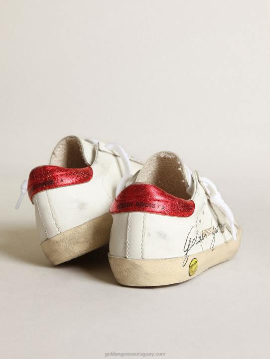 niños zapatillas deportivas young super-star con estrella de ante gris hielo y refuerzo del talón de piel metalizada rojaGolden Goose 02H6869